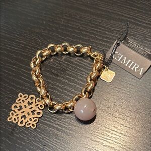 Gold and Brown Charm Bracelet with Snowflake Design